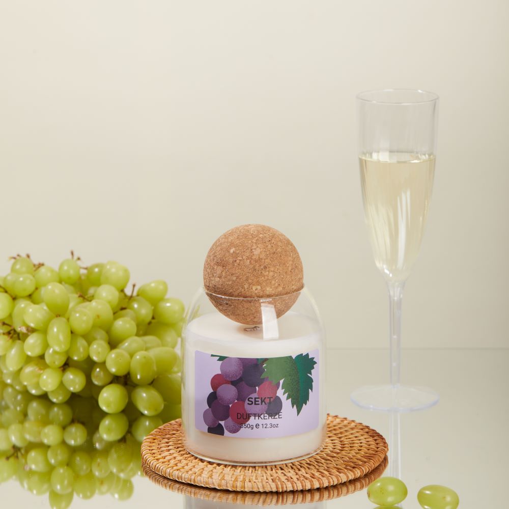 Duftkerze im Glas Sekt