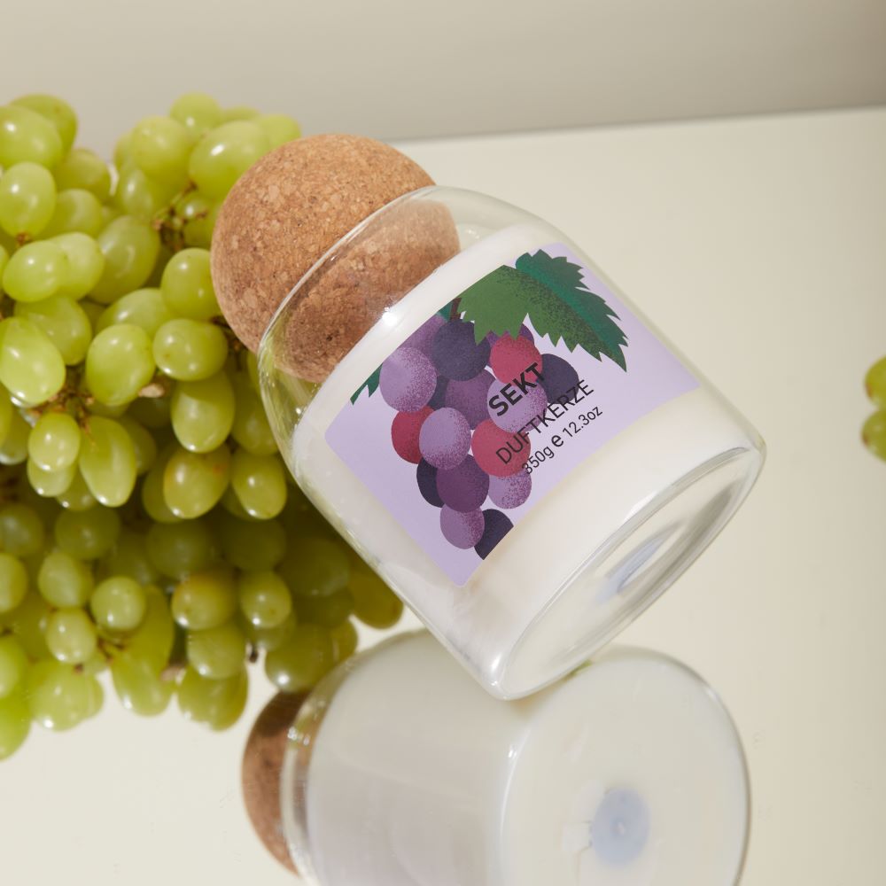 Duftkerze im Glas Sekt